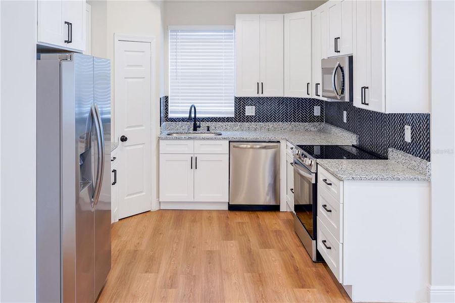 Furnished interior view inside a new home in , Tampa (Image 11). Furnished interior view inside a new home in , Tampa (Image 11).