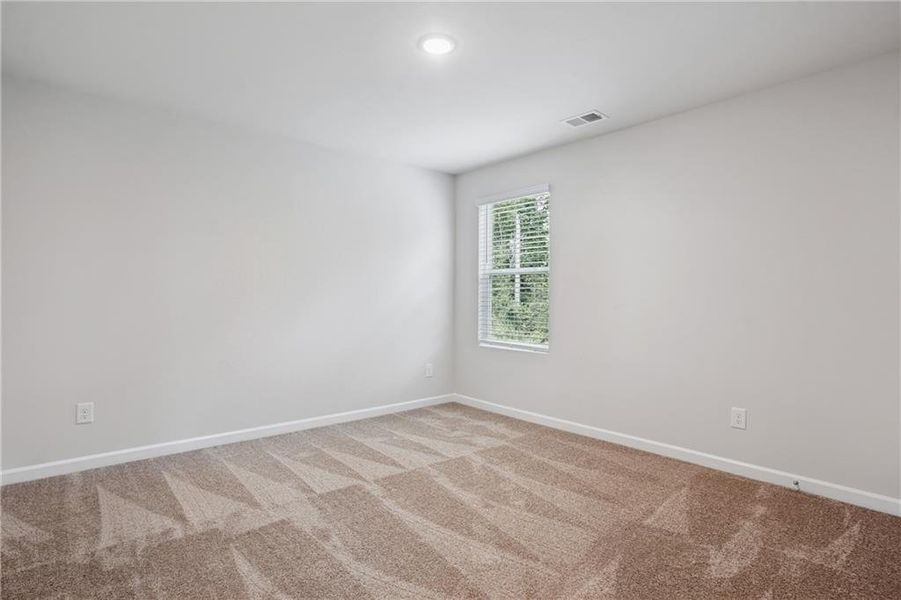 Spacious, unfurnished interior of a new home in River Walk Farm, Covington (Image 32).