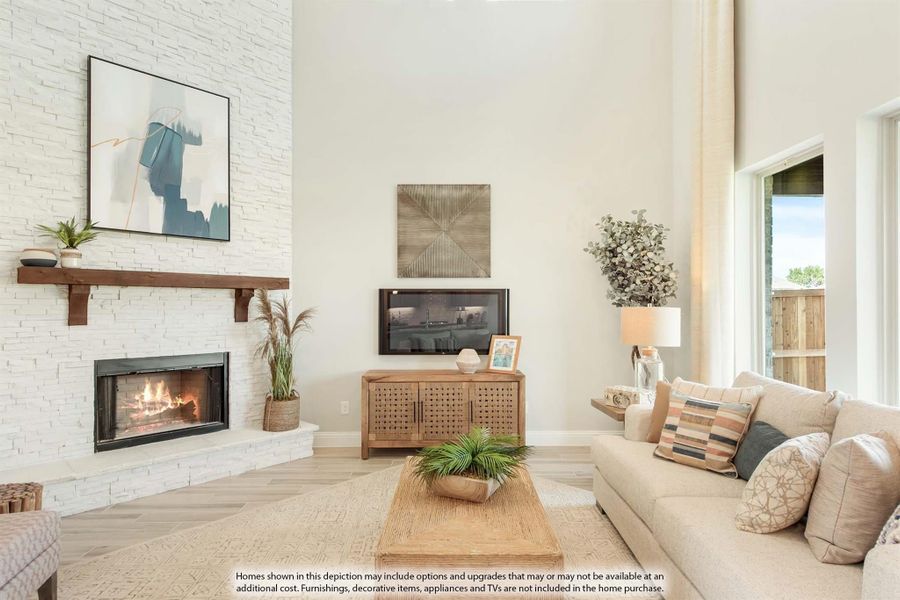 Living room with white stacked stone fireplace, wood mantel, high ceilings, and neutral sofa seating. Living room with white stacked stone fireplace, wood mantel, high ceilings, and neutral sofa seating.