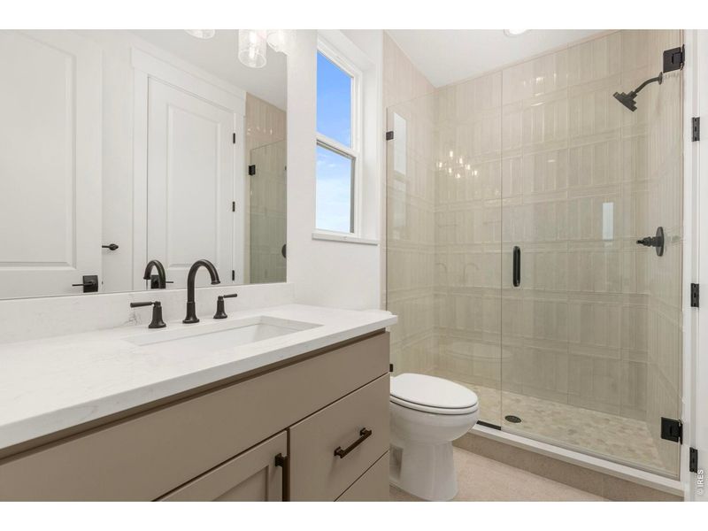 Furnished interior view inside a new home in RainDance, Windsor (Image 12).