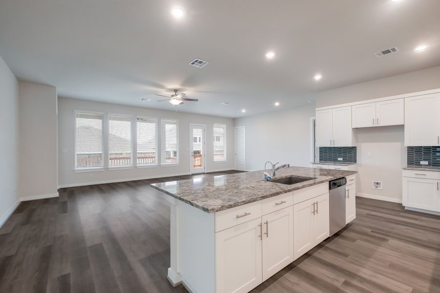 Representative furnished interior of a home built from the Englewood by Scott Felder Homes in Prominence, San Antonio (Image 8).