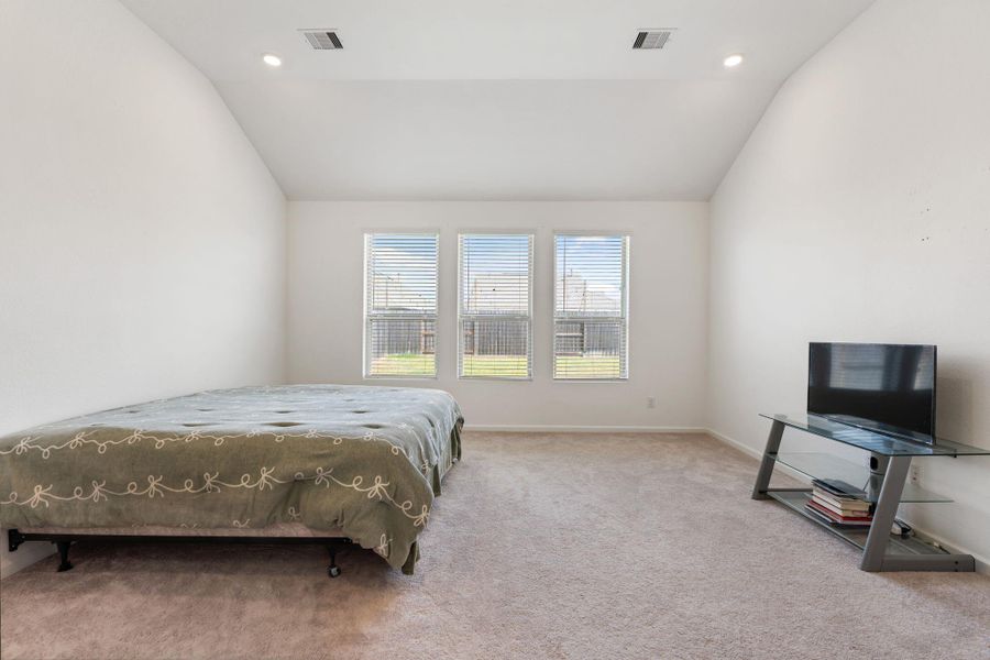 Furnished interior view inside a new home in Sunterra, Katy (Image 16).
