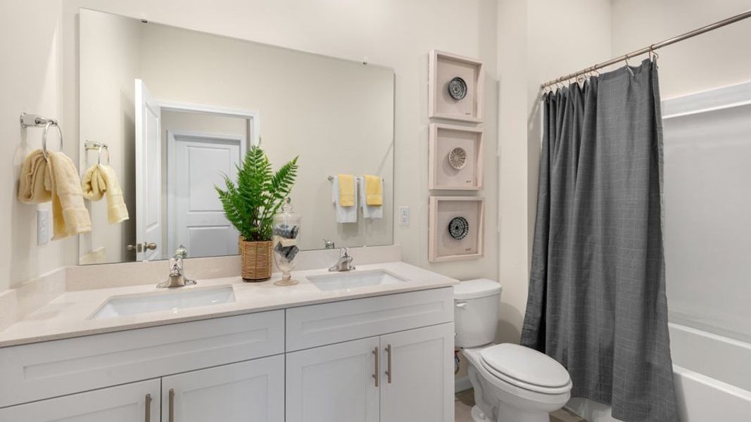 Representative furnished interior of a home built from the Booth by D.R. Horton in Anderson Farm, Wendell (Image 17).