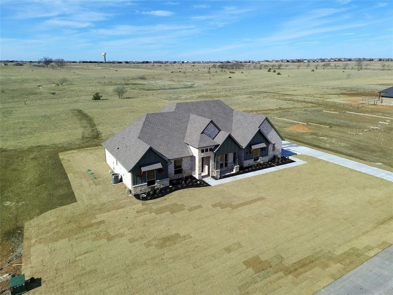Front exterior of a new home in , Godley, TX, highlighting curb appeal (Image 26).