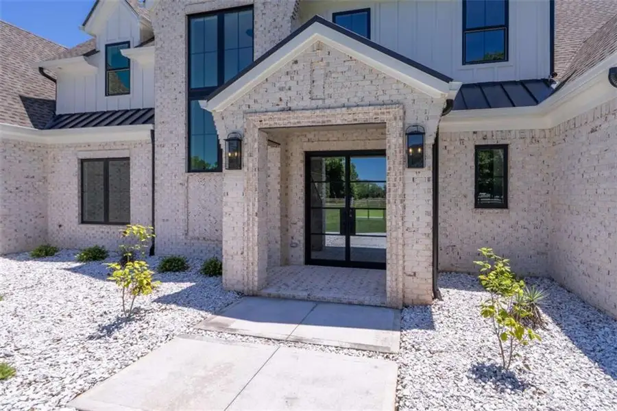 Exterior details and patio area of a home in , Monroe (Image 3).