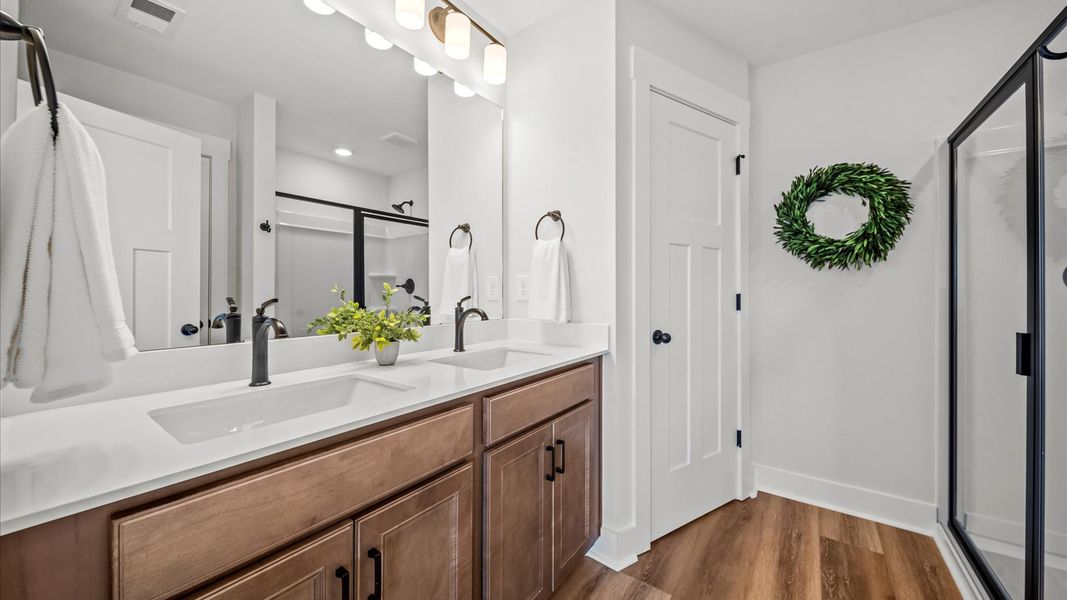 Representative furnished interior of a home built from the Corner Litchfield by DRB Homes in Gresham Station, Simpsonville (Image 22).