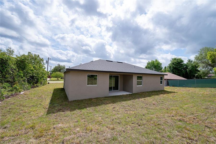 Exterior details and patio area of a home in , North Port (Image 26).