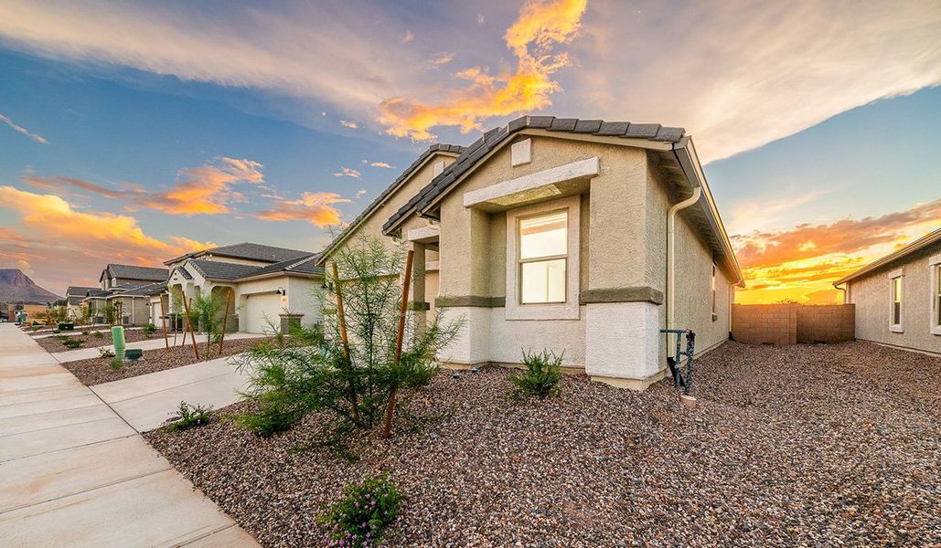 Front exterior of a new home in Saguaro Bloom, Marana, AZ, highlighting curb appeal (Image 2).