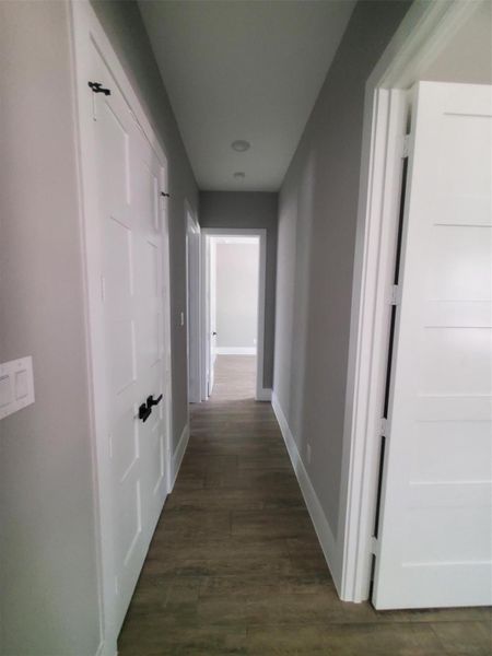 HALLWAY LEADING TO 3 SECONDARY BEDROOM AND HALLWAY CLOSET ON THE LEFT HALLWAY LEADING TO 3 SECONDARY BEDROOM AND HALLWAY CLOSET ON THE LEFT