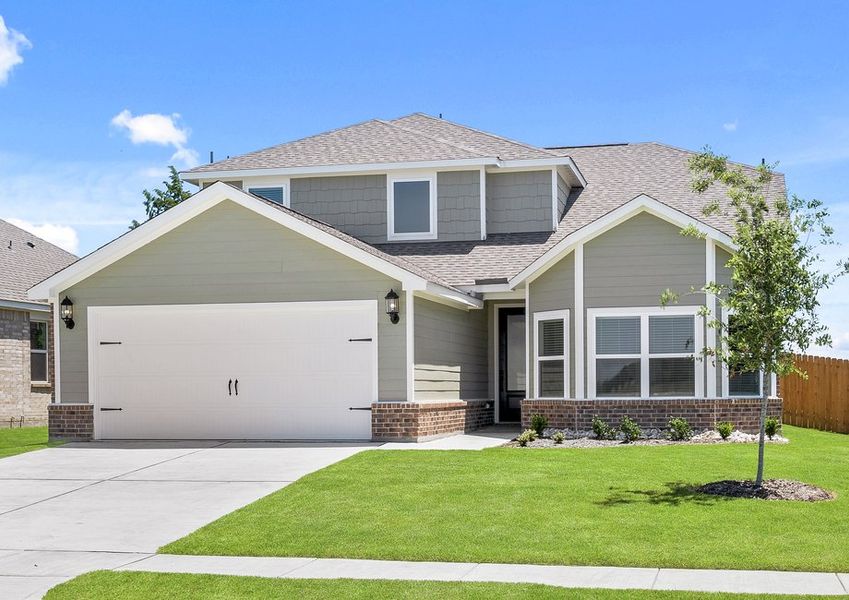 The two-story Cypress floor plan is a beautiful siding home with brick accents.