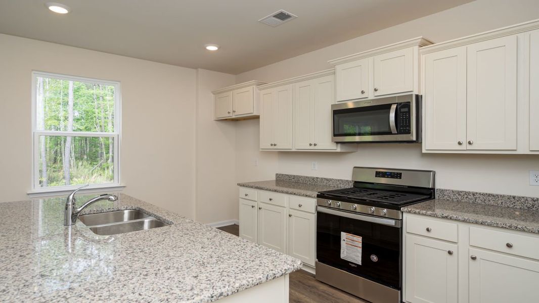 Representative furnished interior of a home built from the Arden by D.R. Horton in Halls Landing, Bolivia (Image 9). Representative furnished interior of a home built from the Arden by D.R. Horton in Halls Landing, Bolivia (Image 9).