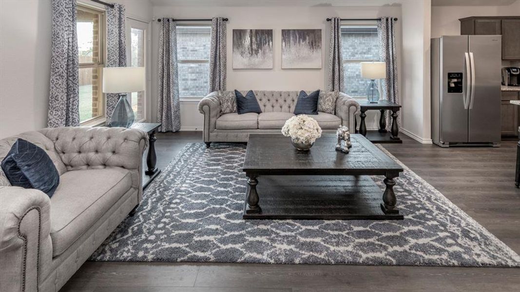 Living area with dark wood finished floors