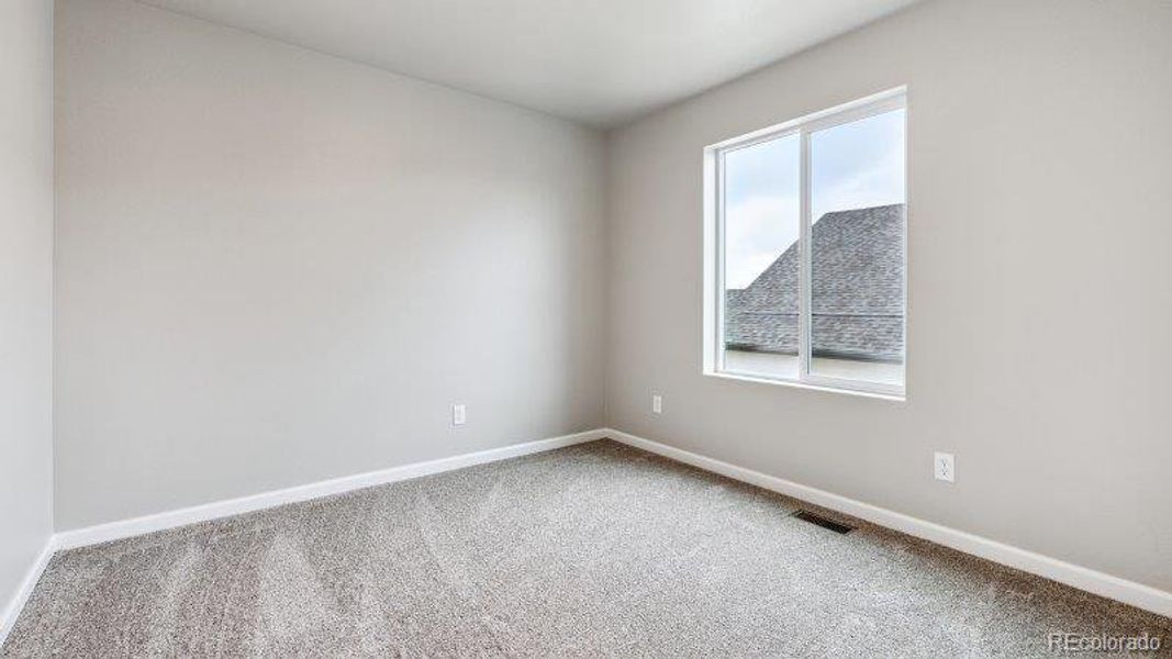Spacious, unfurnished interior of a new home in Highlands Preserve, Mead (Image 17).