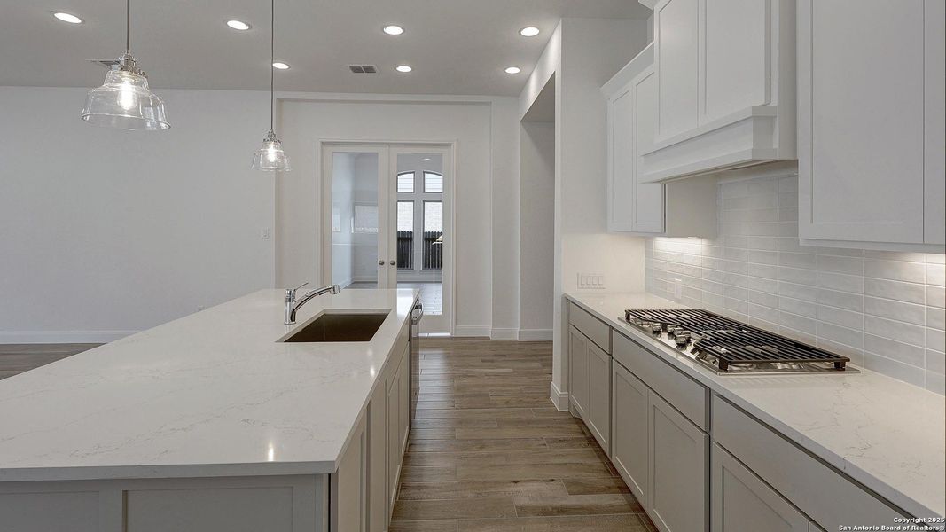 Furnished interior view inside a new home in Kallison Ranch 50', San Antonio (Image 11).