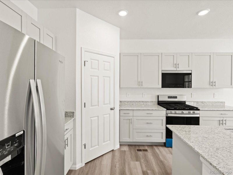 Furnished interior view inside a new home in Ridgeline Vista: The Flora Collection, Brighton (Image 12).