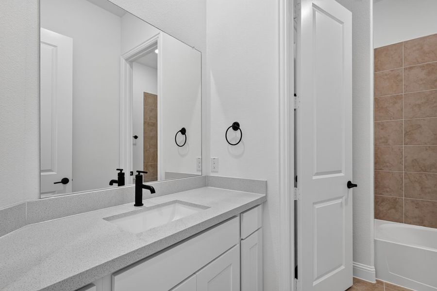 Furnished interior view inside a new home in Highland Lakes, McKinney (Image 13).