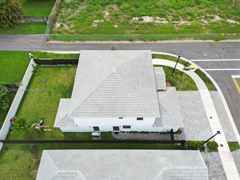 Front exterior of a new home in , Miami, FL, highlighting curb appeal (Image 21). Front exterior of a new home in , Miami, FL, highlighting curb appeal (Image 21).