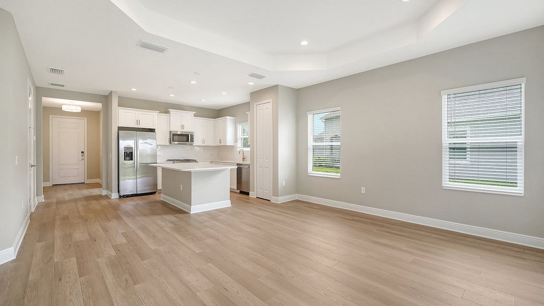 Spacious, unfurnished interior of a new home in Wildleaf Real Estate and Homes for Sale in Parrish, FL - Neal Communities, Parrish (Image 19).