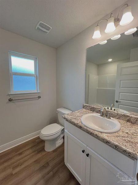 Furnished interior view inside a new home in Pine Top, Cantonment (Image 4).