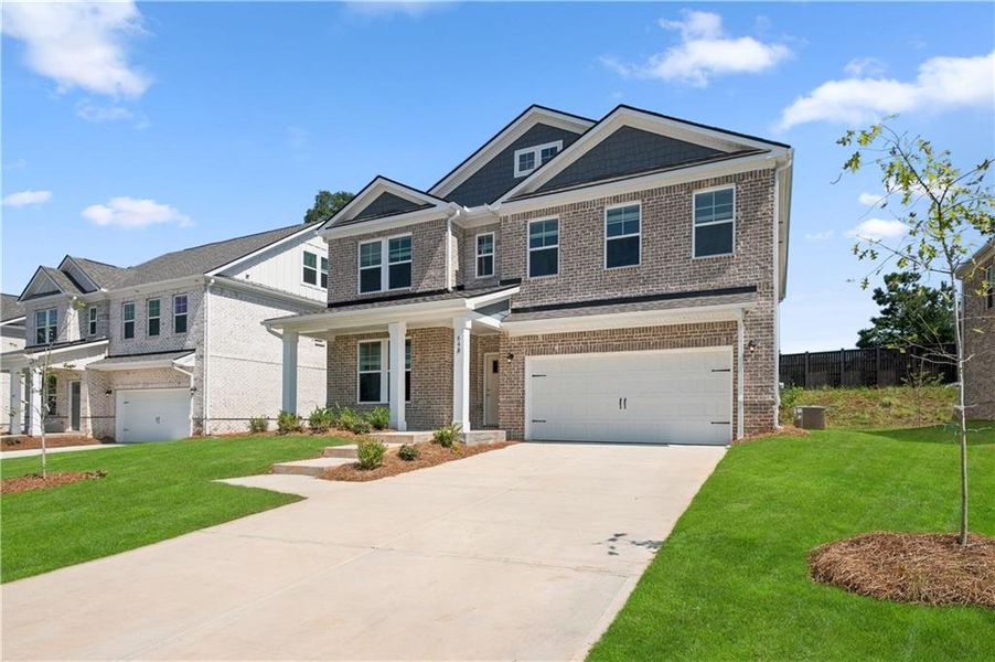 Front exterior of a new home in Bowers Farm, McDonough, GA, highlighting curb appeal (Image 16).