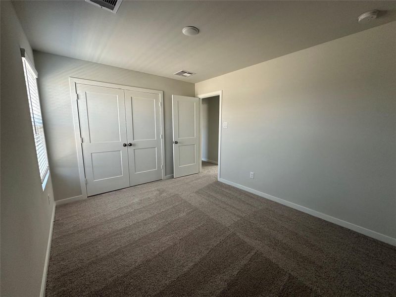 Spacious, unfurnished interior of a new home in Lonestar Collection at Aurora, Katy (Image 23).