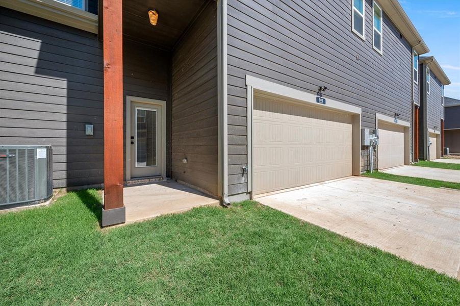 Soaring covered back Porch, Security Lighting, Exterior Electric Outlet, Grassy area