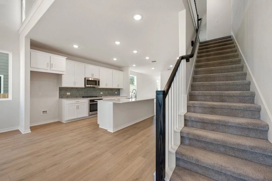 Furnished interior view inside a new home in Lariat, Liberty Hill (Image 29). Furnished interior view inside a new home in Lariat, Liberty Hill (Image 29).