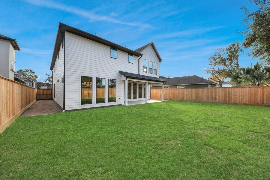Exterior details and patio area of a home in , Houston (Image 4).