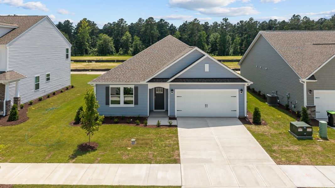 Front exterior of a new home in West New Bern, New Bern, NC, highlighting curb appeal (Image 16).