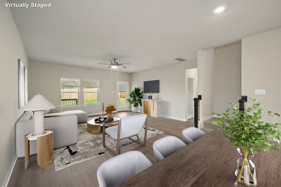 Virtually staged dining room and living room in the Matador floorplan in the Meritage Homes community.