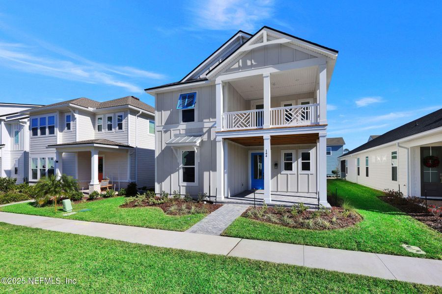 Front exterior of a new home in , Ponte Vedra, FL, highlighting curb appeal (Image 20).