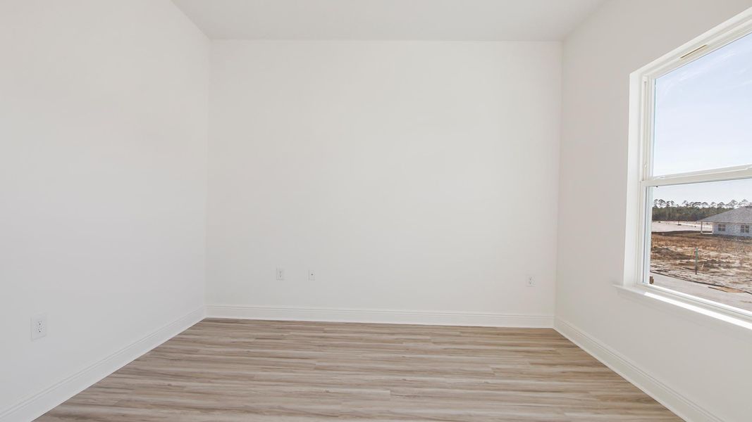 Spacious, unfurnished interior of a new home in Bayside at Ward Creek, Panama City Beach (Image 36).