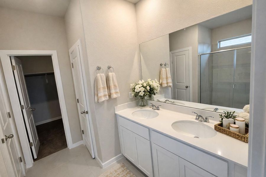 Primary Bath retreat with dual vanities & walk-in shower