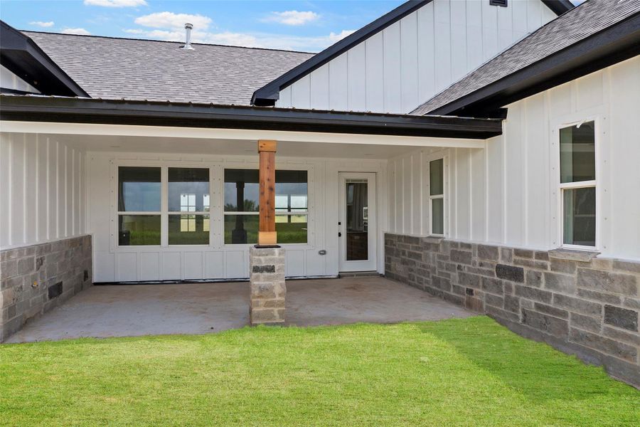 Expansive back patio perfect for outdoor entertaining and relaxation.