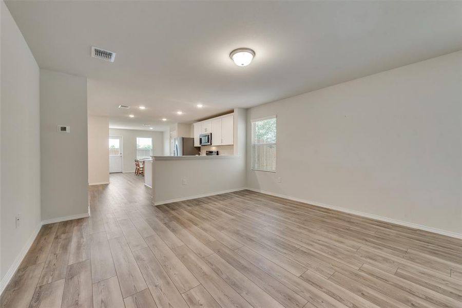 Living room with pretty LVP floors.