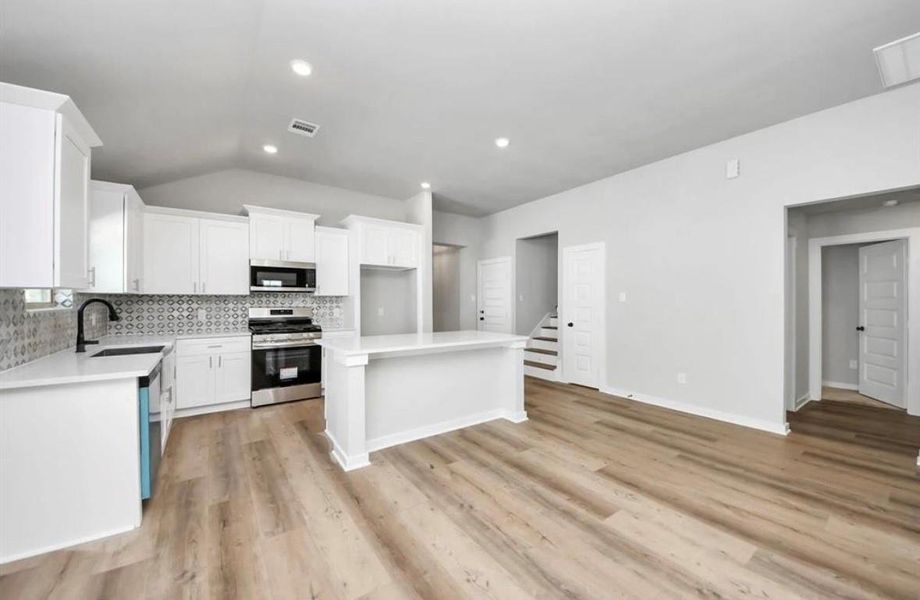 Furnished interior view inside a new home in , Manvel (Image 9).