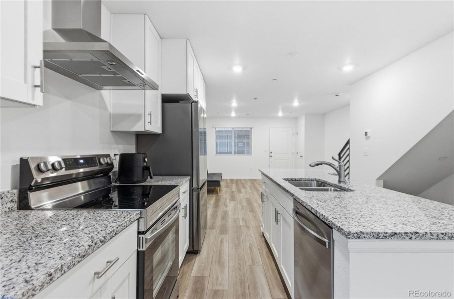 Furnished interior view inside a new home in Reunion, Commerce City (Image 6).