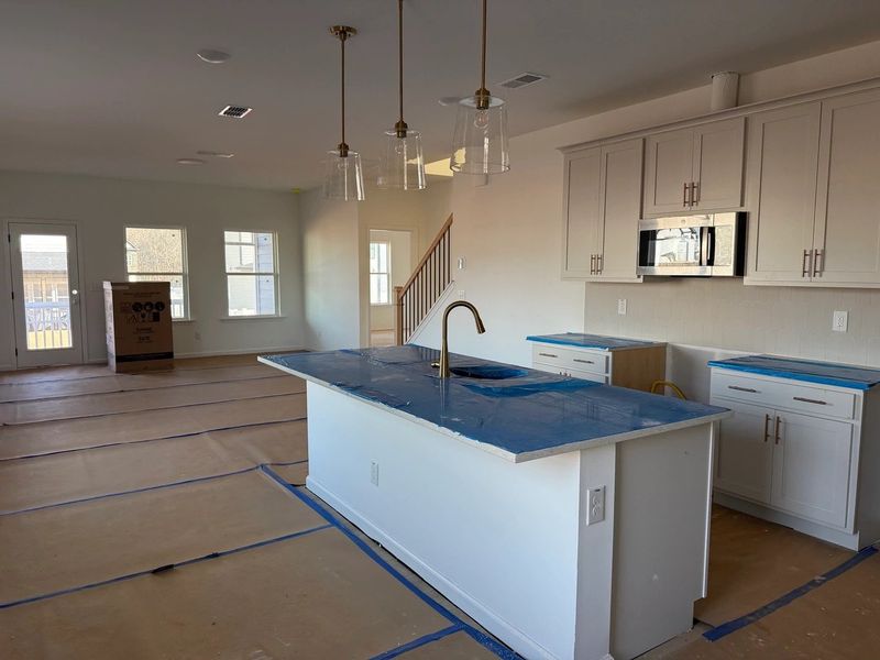 Kitchen featuring the AW Collection® Serene - Clean lines and earthy textures define the space.