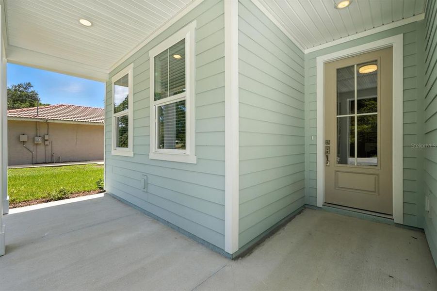 Exterior details and patio area of a home in Palm Coast Homes, Palm Coast (Image 3).