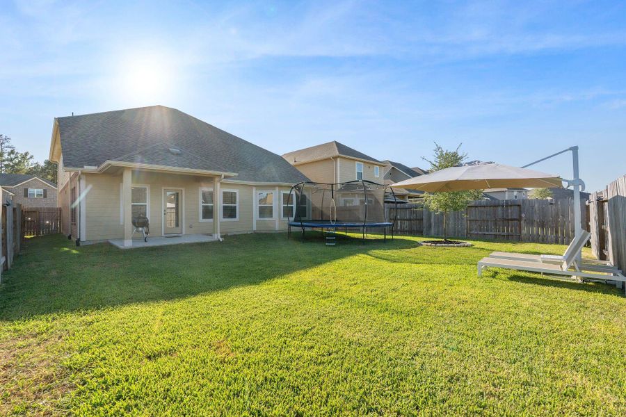 Exterior details and patio area of a home in Pine Lake Cove - Classic Series, Montgomery (Image 19). Exterior details and patio area of a home in Pine Lake Cove - Classic Series, Montgomery (Image 19).