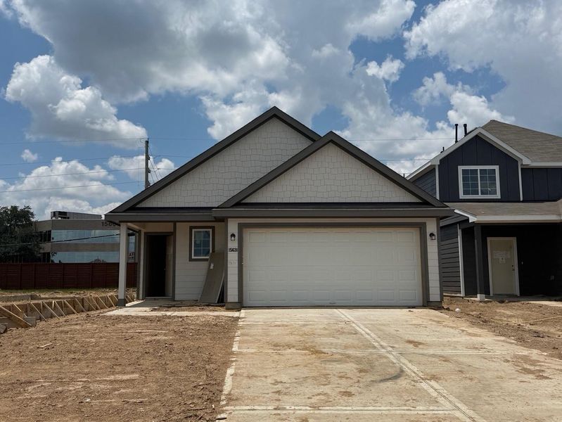 Front exterior of a new home in Bammel Oaks, Houston, TX, highlighting curb appeal (Image 2). Front exterior of a new home in Bammel Oaks, Houston, TX, highlighting curb appeal (Image 2).