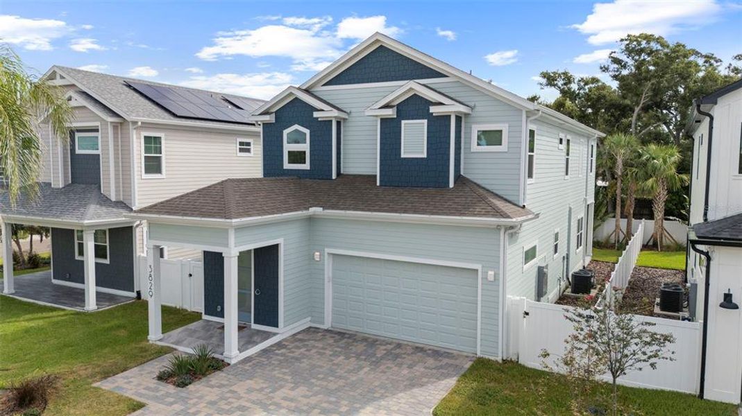 Front exterior of a new home in , St. Petersburg, FL, highlighting curb appeal (Image 26).
