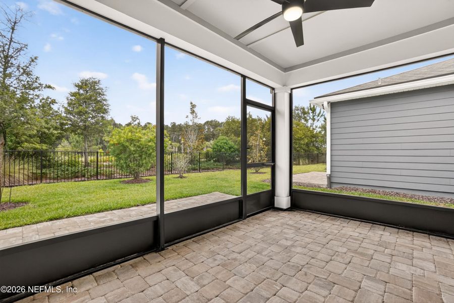 Exterior details and patio area of a home in Del Webb Wildlight, Wildlight (Image 21). Exterior details and patio area of a home in Del Webb Wildlight, Wildlight (Image 21).