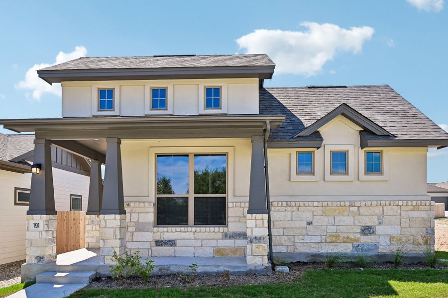 Front exterior of a new home in Sage Hollow, Kyle, TX, highlighting curb appeal (Image 1). Front exterior of a new home in Sage Hollow, Kyle, TX, highlighting curb appeal (Image 1).