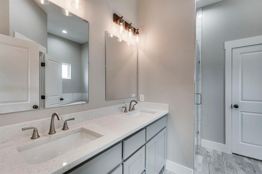 Bathroom with dual bowl vanity