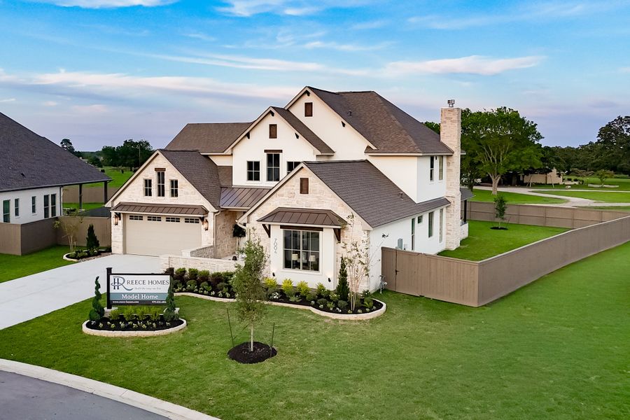 Front exterior of a new home in Stella Ranch, Bryan, TX, highlighting curb appeal (Image 26).