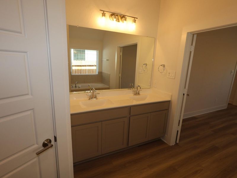Furnished interior view inside a new home in Lone Star Landing, Montgomery (Image 11).