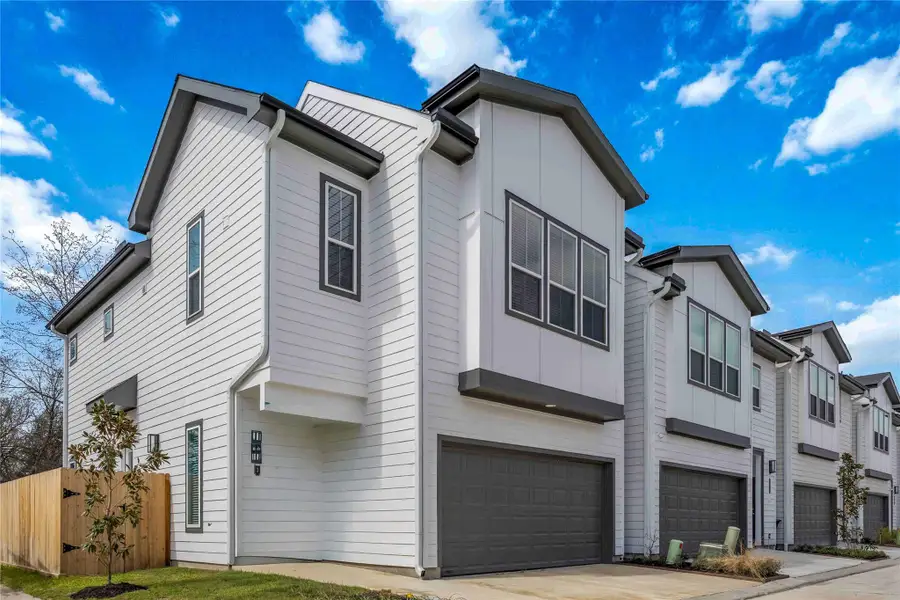 Front exterior of a new home in Fulton Crossing, Houston, TX, highlighting curb appeal (Image 2). Front exterior of a new home in Fulton Crossing, Houston, TX, highlighting curb appeal (Image 2).