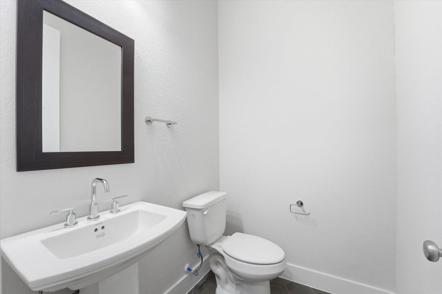 Furnished interior view inside a new home in Bridgeland, Cypress (Image 8).