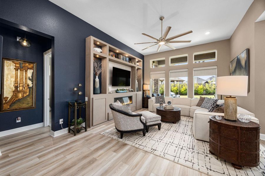 Custom built in 55" designer fireplace, accented in a soft stone finish.